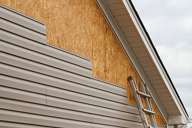 Professional Siding Installation technician working in Hollidaysburg, PA